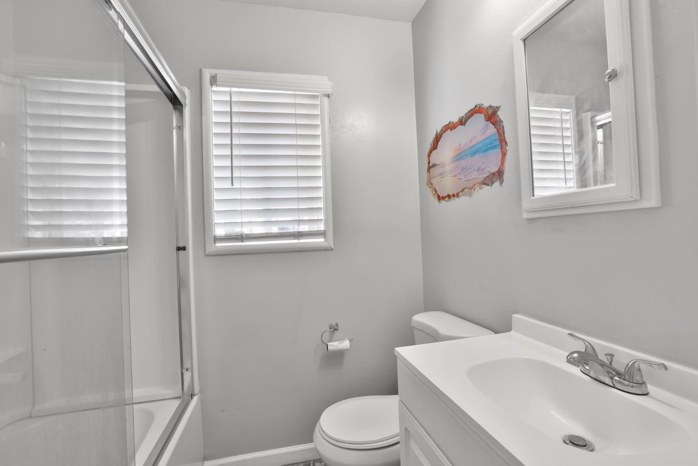 1431 Dwight Way Berkeley, CA 94702 - Photo 14 of 21 a bathroom with a sink and a toilet