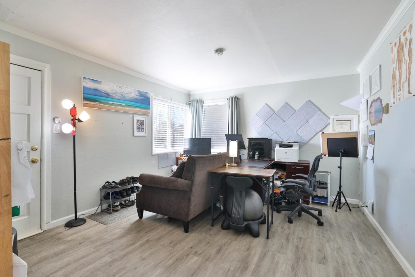 1431 Dwight Way Berkeley, CA 94702 - Photo 6 of 21 a living room with furniture and a wooden floor