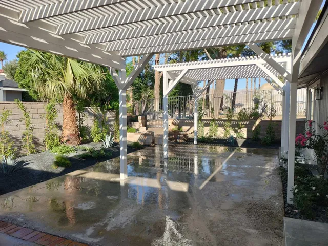 a view of street with flower and trees