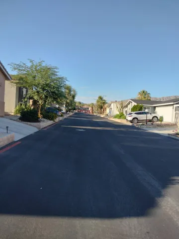 a view of a house with a street