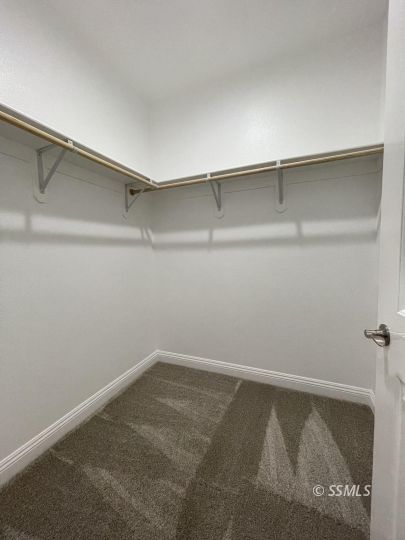 846 Harriet Street Ridgecrest, CA 93555 - Photo 15 of 21 a view of a room with shelf