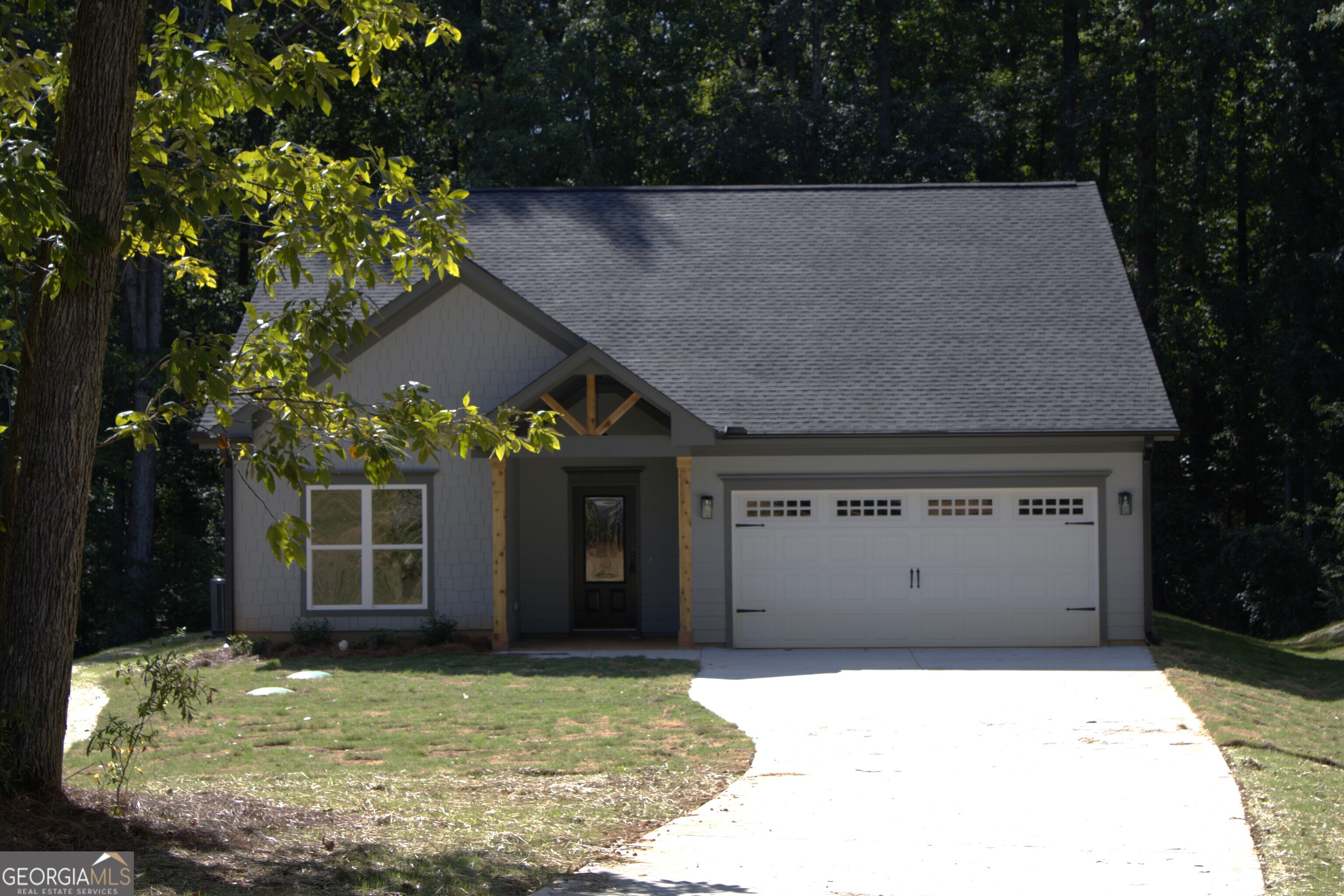 a view of outdoor space yard and garage