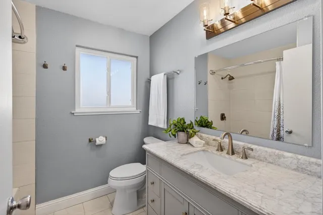 a front view of a house with garage