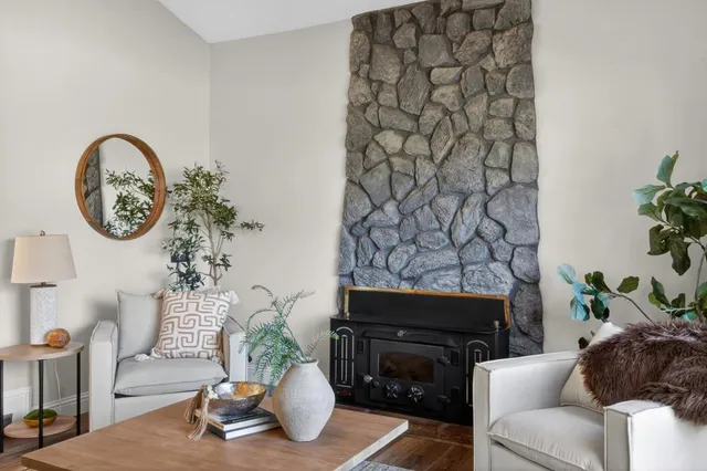 a kitchen with a sink and a large window