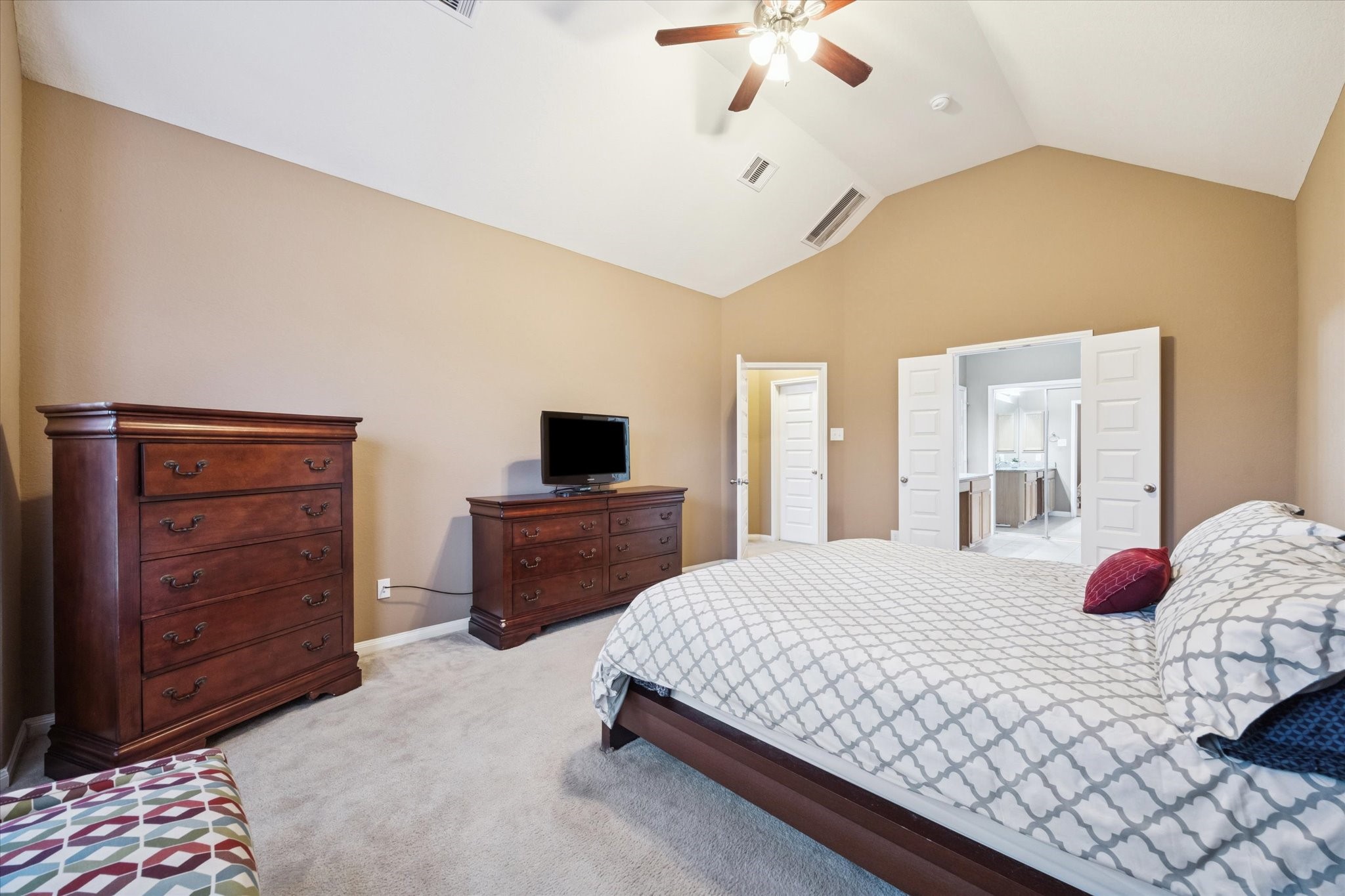 7023 Sliding Rock Circle Spring, TX 77379 - Photo 17 of 39 a bedroom with a bed and wooden floor
