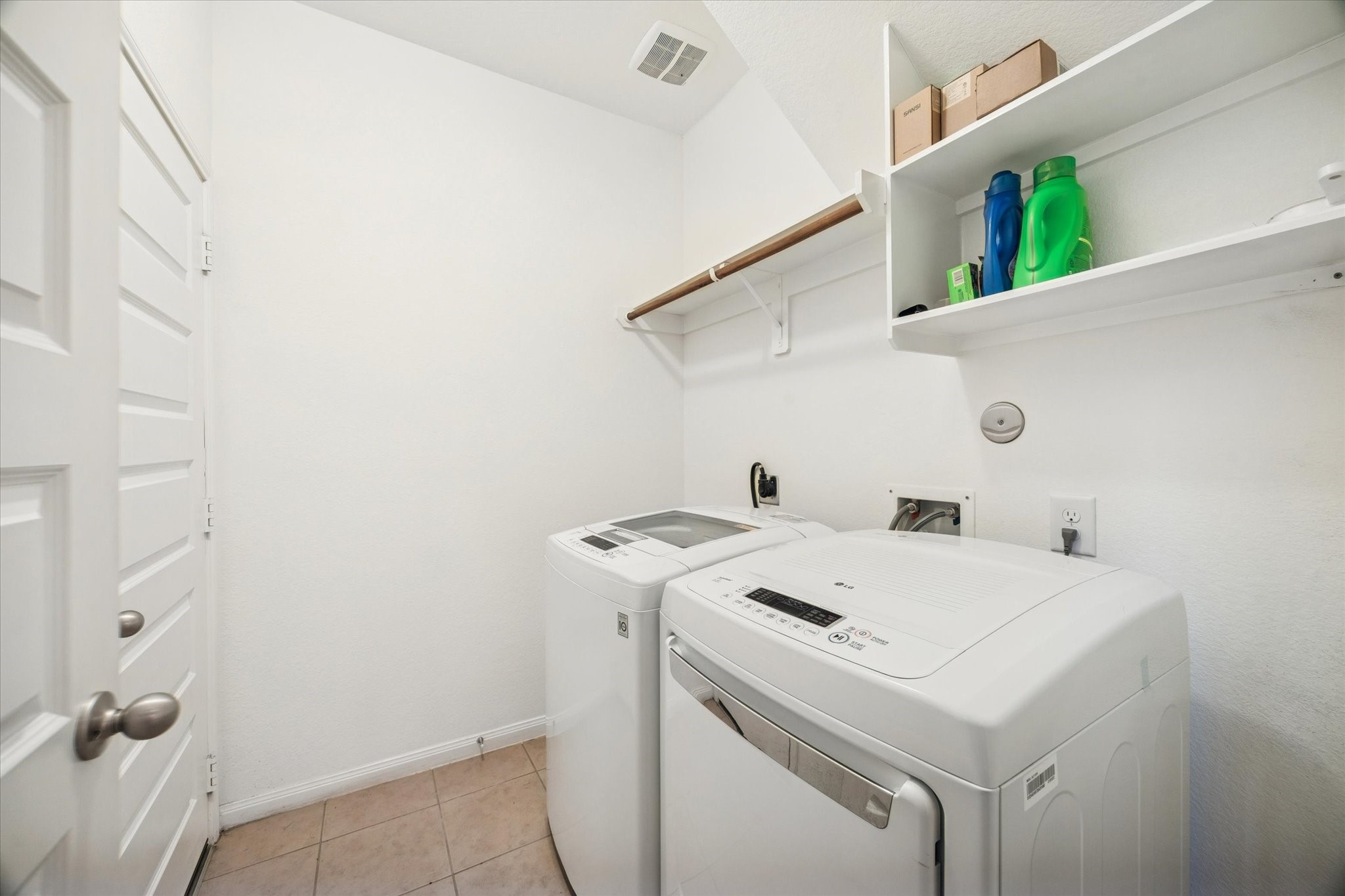 7023 Sliding Rock Circle Spring, TX 77379 - Photo 26 of 39 a utility room with dryer and washer