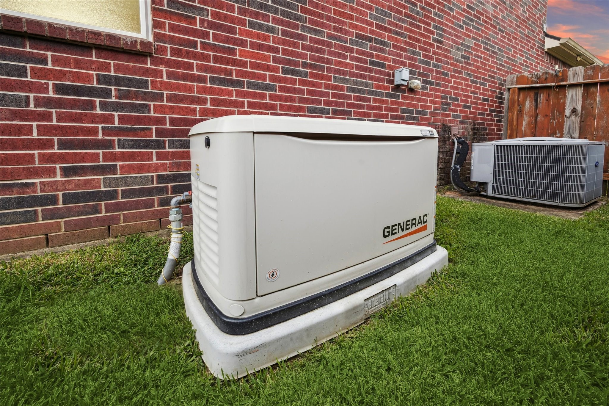 7023 Sliding Rock Circle Spring, TX 77379 - Photo 29 of 39 a view of a fireplace in the back yard