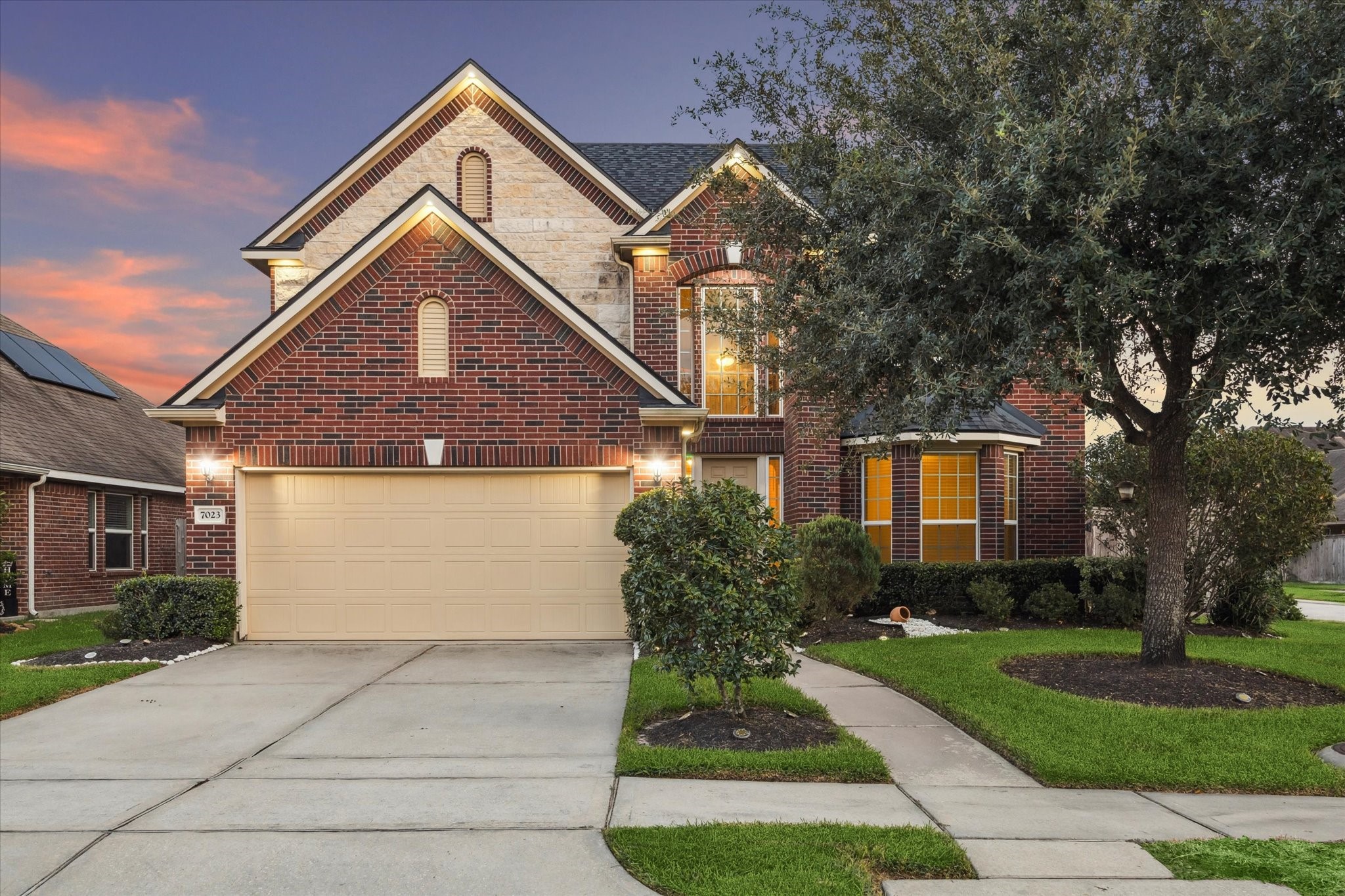 7023 Sliding Rock Circle Spring, TX 77379 - Photo 38 of 39 front view of house with a yard