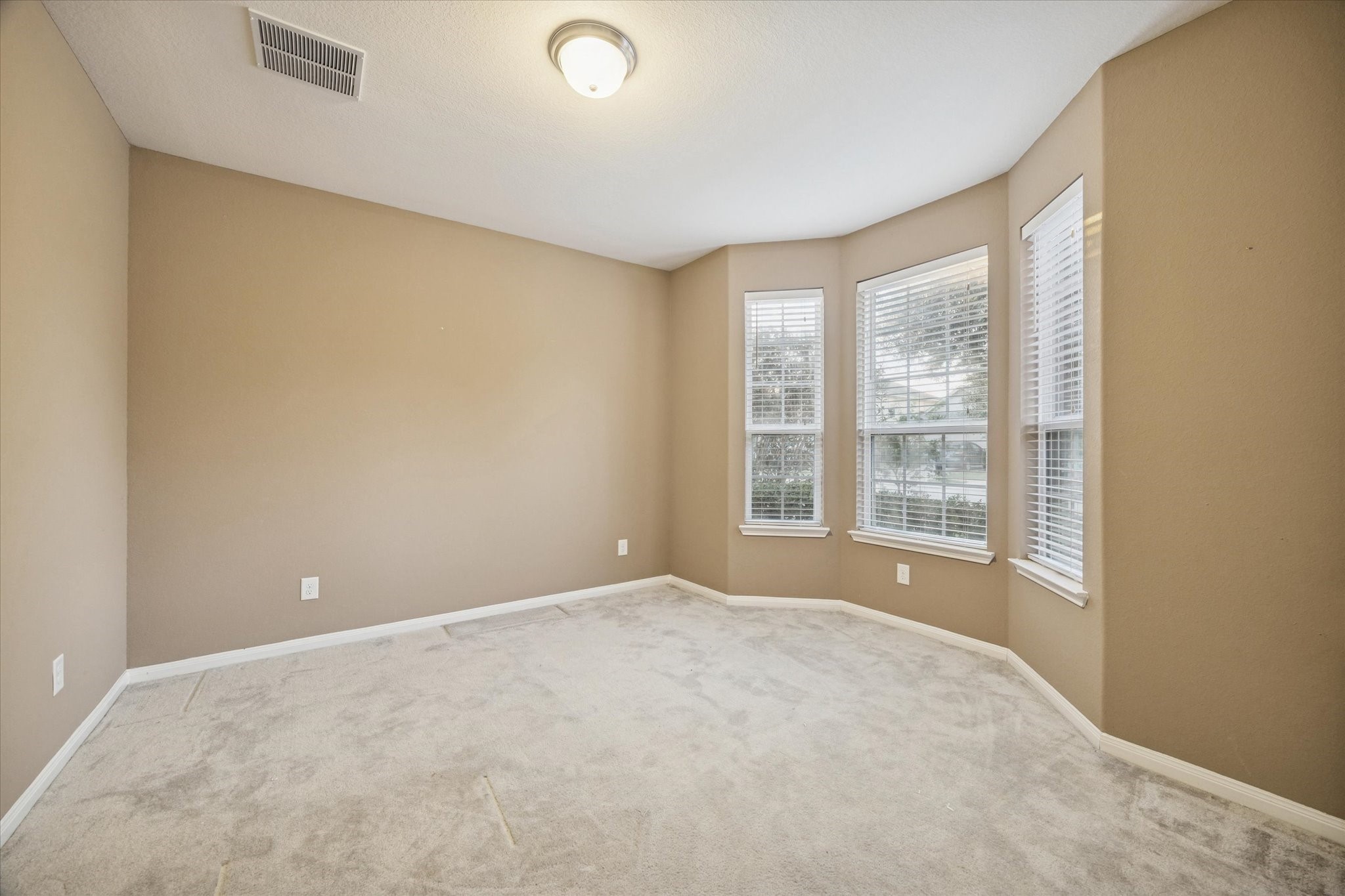7023 Sliding Rock Circle Spring, TX 77379 - Photo 4 of 39 a view of an empty room with a window