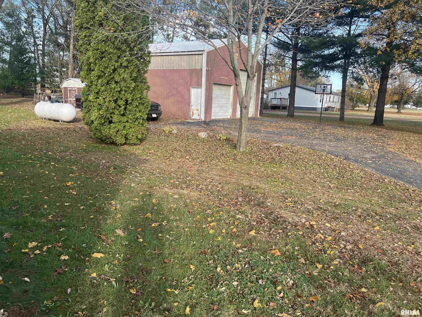 3638-84 84th Thomson, IL 61285 - Photo 14 of 43 a backyard of a house with lots of green space