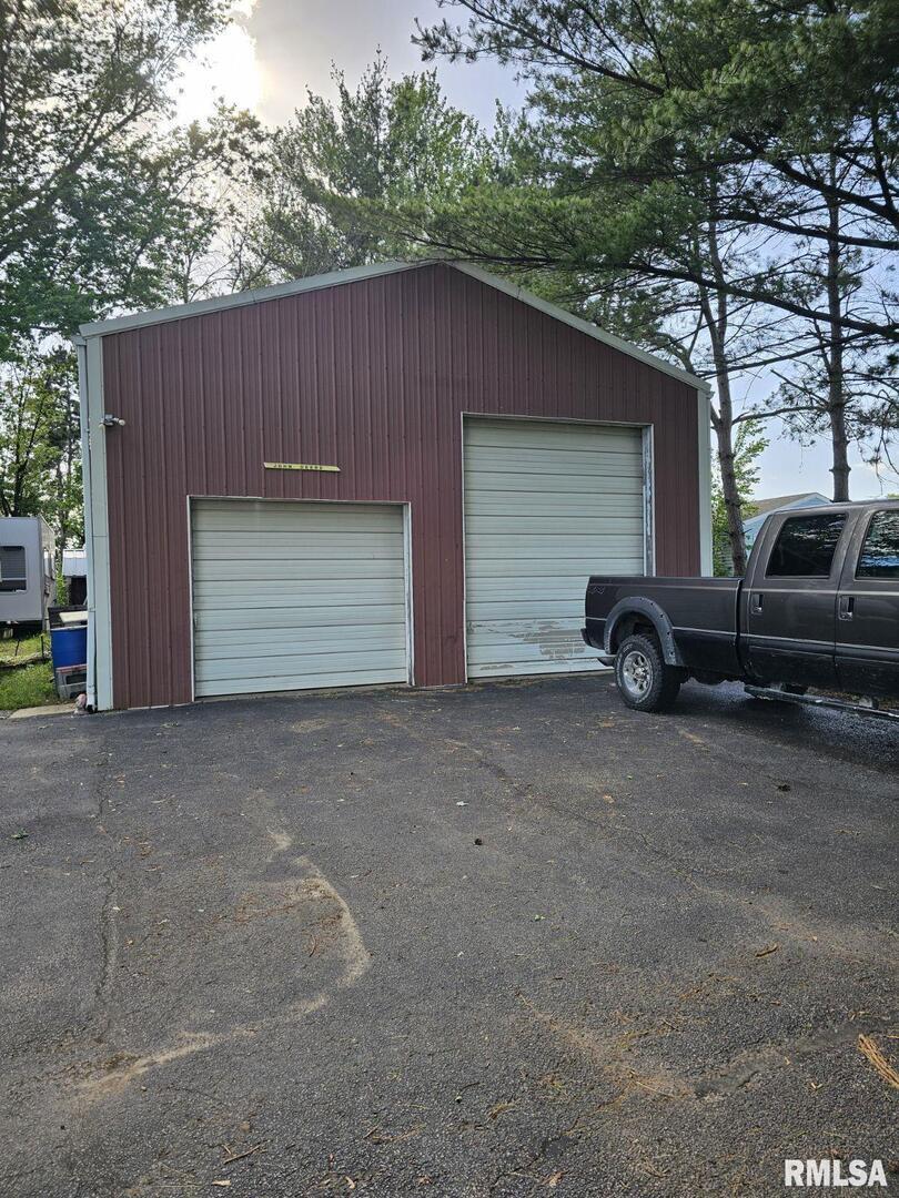 3638-84 84th Thomson, IL 61285 - Photo 15 of 43 a view of a car garage
