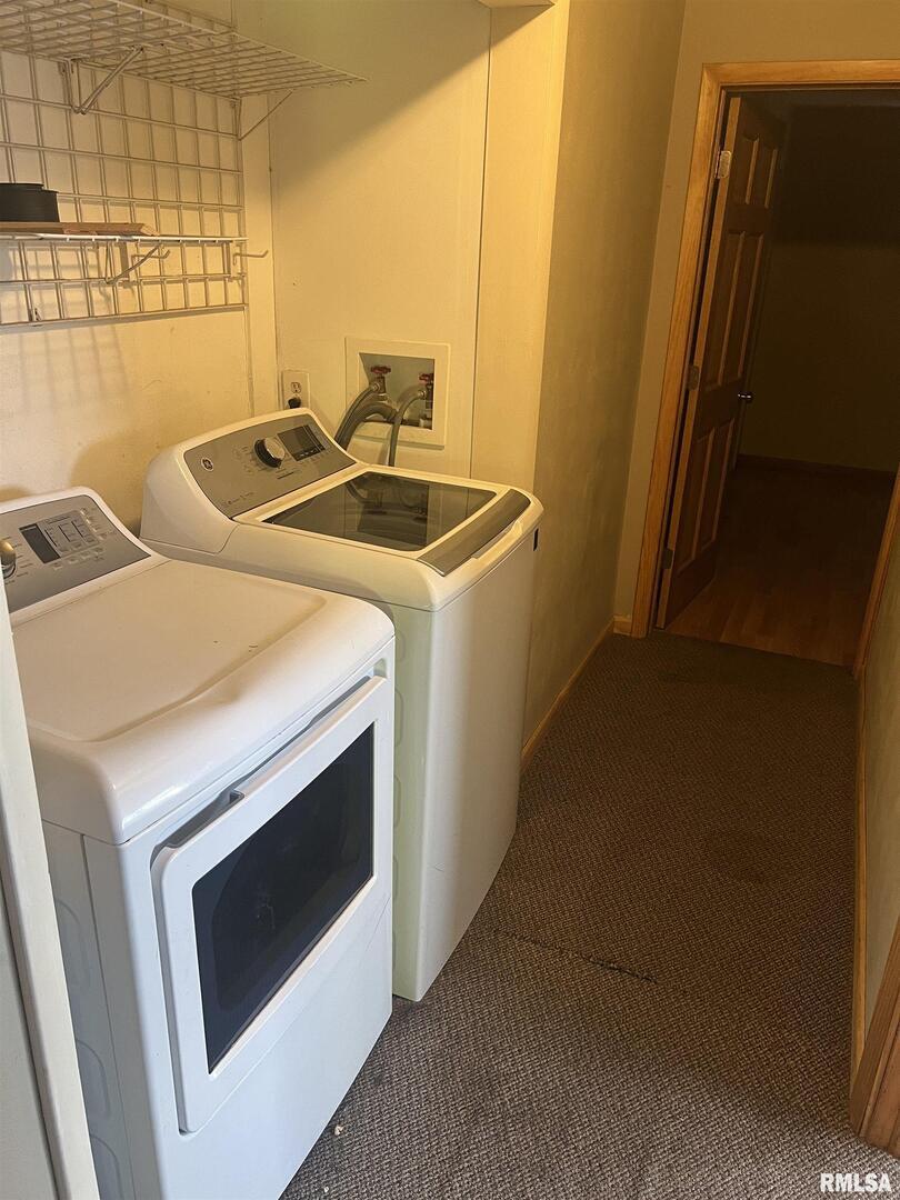 3638-84 84th Thomson, IL 61285 - Photo 28 of 43 a utility room with dryer and washer