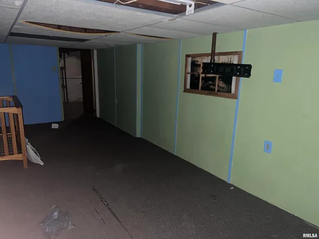 a view of a hallway with stairs