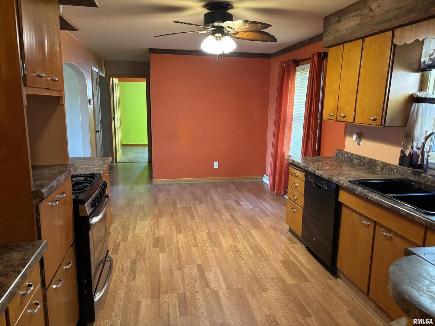 3638-84 84th Thomson, IL 61285 - Photo 4 of 43 a kitchen with a sink appliances and cabinets