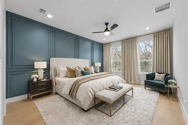 a bathroom with a double vanity sink mirror and double
