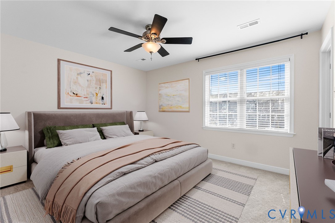 2110 Chaucer Court Aylett, VA 23009 - Photo 24 of 40 a bedroom with a large bed and a window