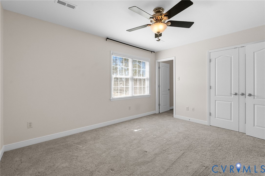 2110 Chaucer Court Aylett, VA 23009 - Photo 27 of 40 a view of an empty room with a window