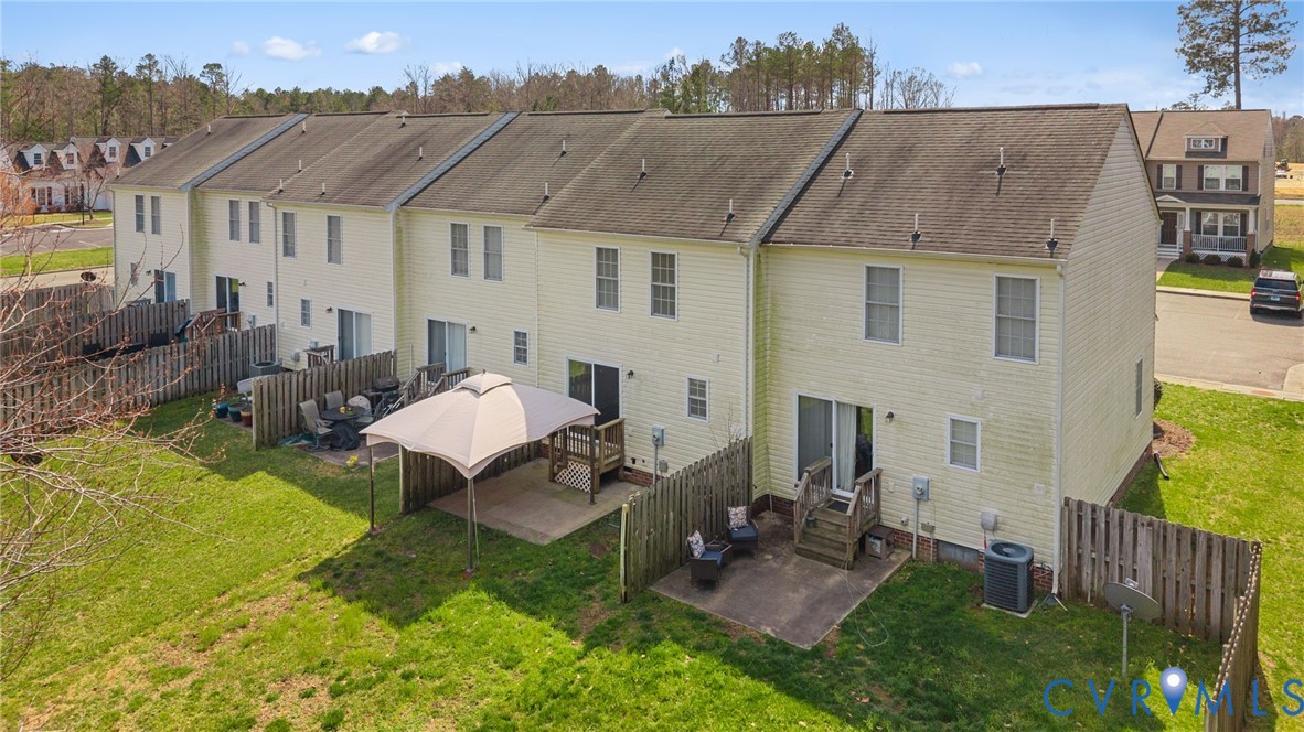 2110 Chaucer Court Aylett, VA 23009 - Photo 38 of 40 a aerial view of a house with swimming pool and a yard