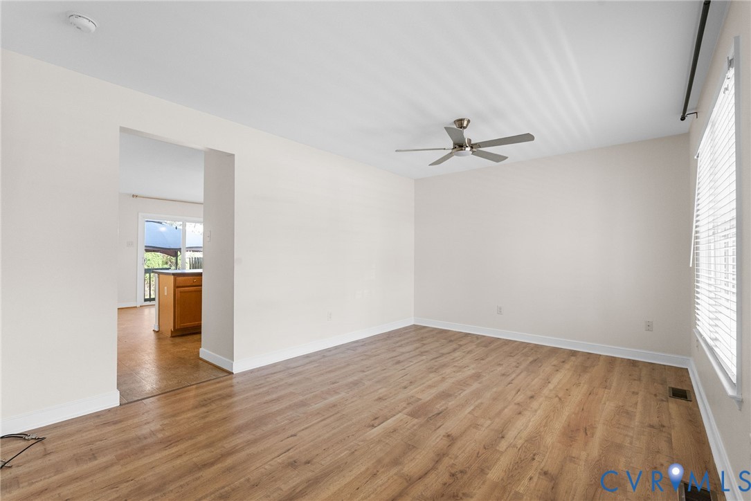2110 Chaucer Court Aylett, VA 23009 - Photo 10 of 40 wooden floor in an empty room with a window