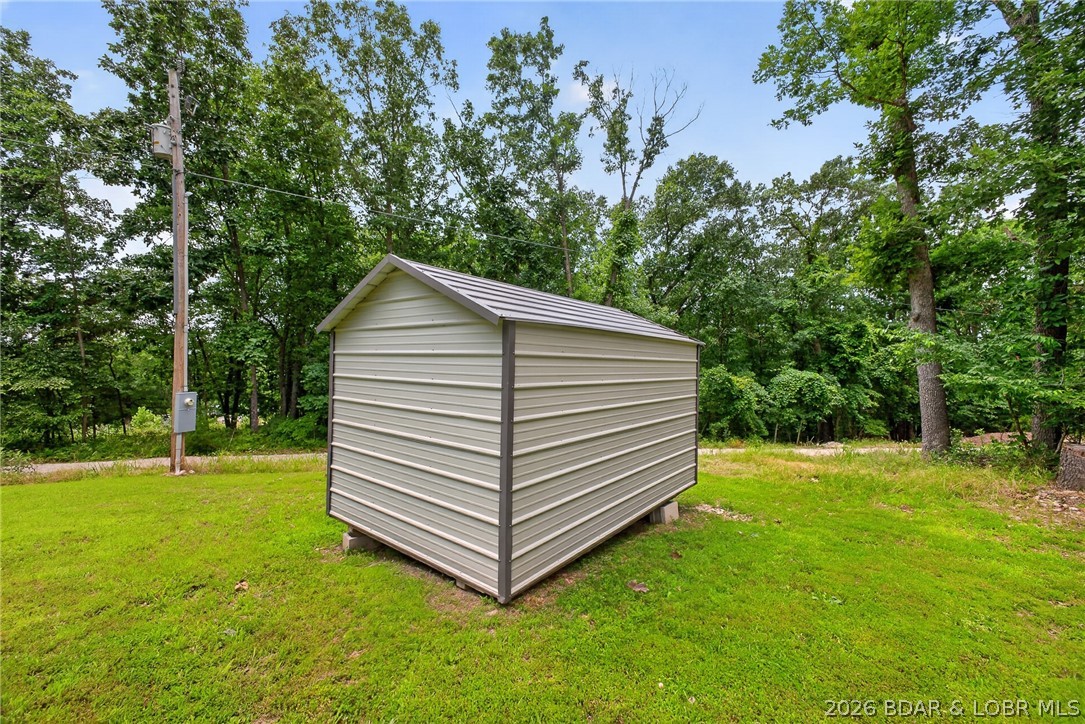 27444 Golden Beach Road Barnett, MO 65011 - Photo 31 of 42 Storage shed