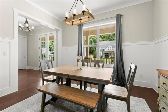 a kitchen with sink stove and cabinets