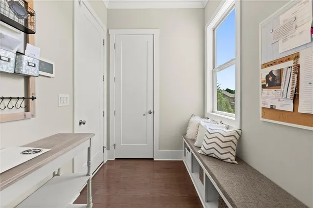a en suite bathroom with a tub double sink and mirror
