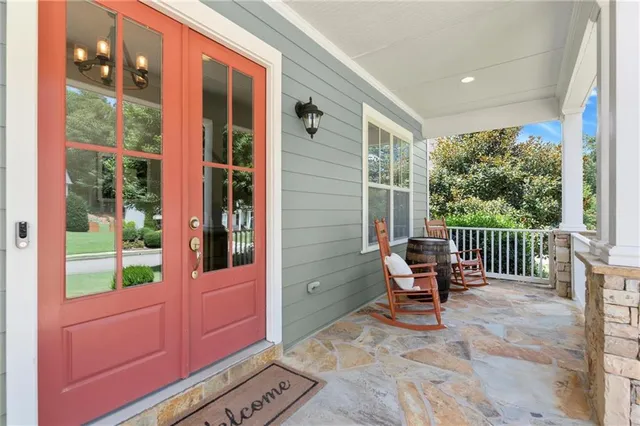 a room with furniture and gym equipment