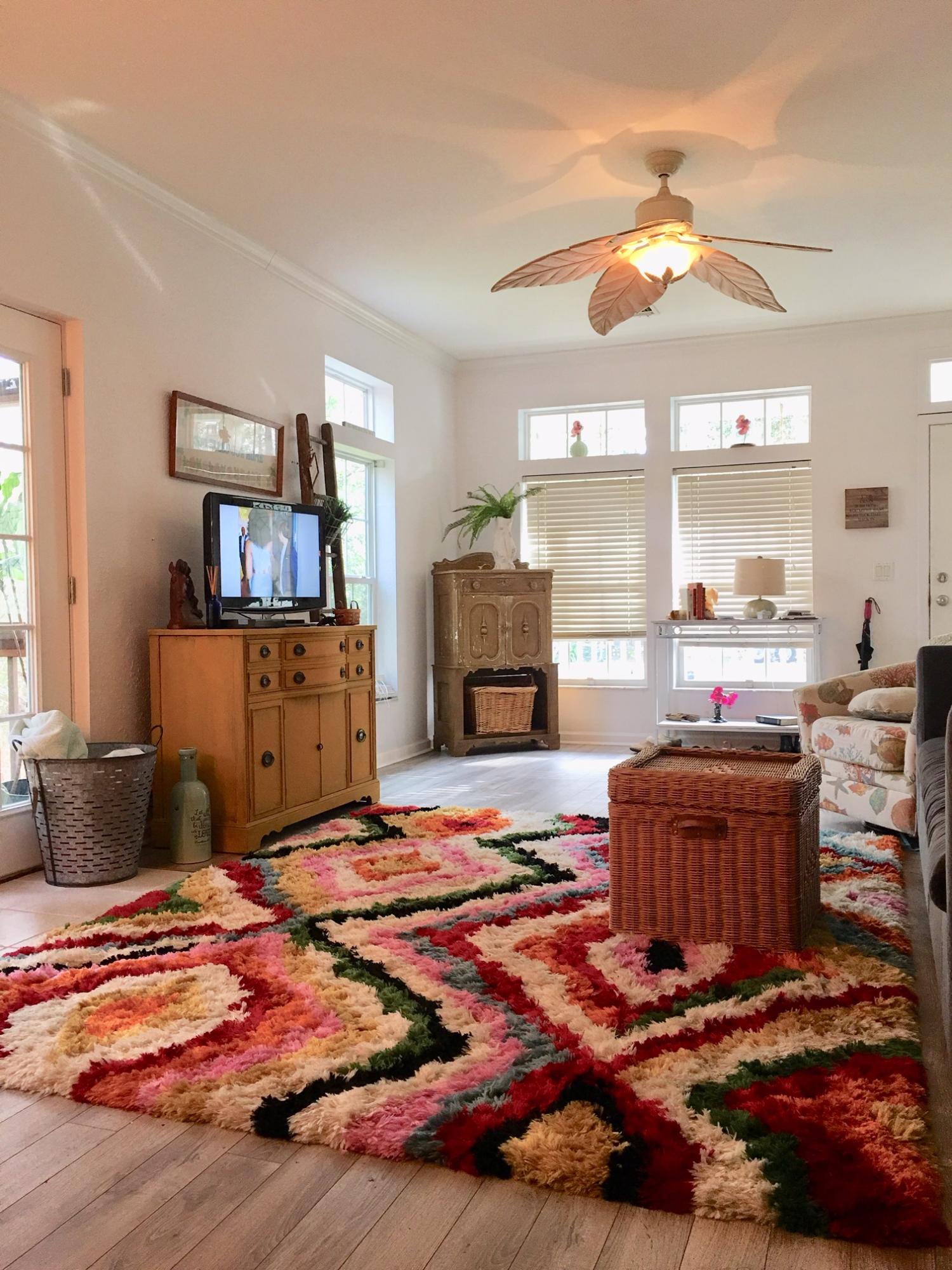 47 Central 7th Street Santa Rosa Beach, FL 32459 - Photo 1 of 19 a bedroom with a bed and wooden floor