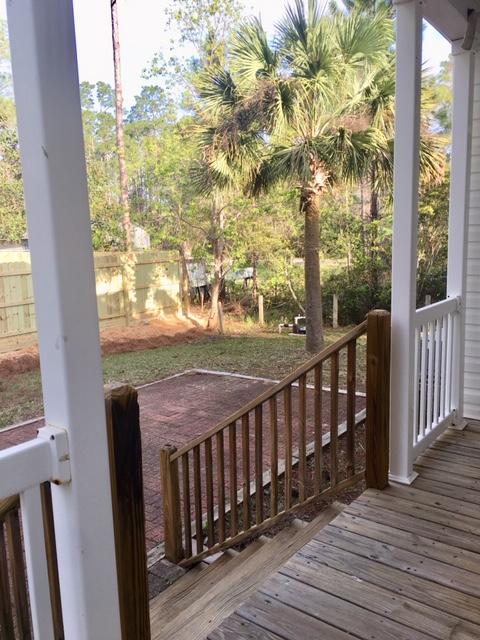 47 Central 7th Street Santa Rosa Beach, FL 32459 - Photo 17 of 19 a view of a balcony with wooden floor