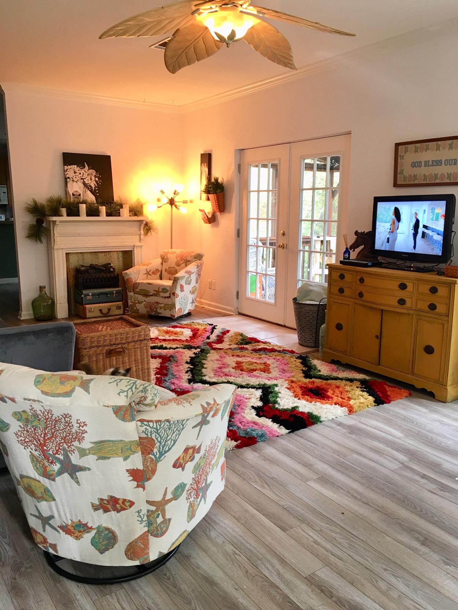 47 Central 7th Street Santa Rosa Beach, FL 32459 - Photo 3 of 19 a living room with furniture and a fireplace
