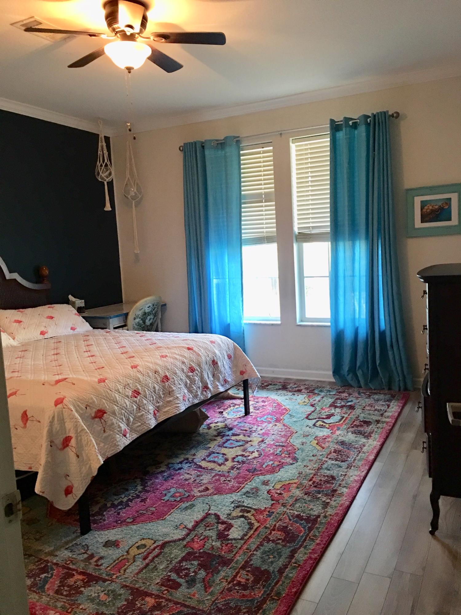 47 Central 7th Street Santa Rosa Beach, FL 32459 - Photo 6 of 19 a bedroom with a bed and a flat screen tv