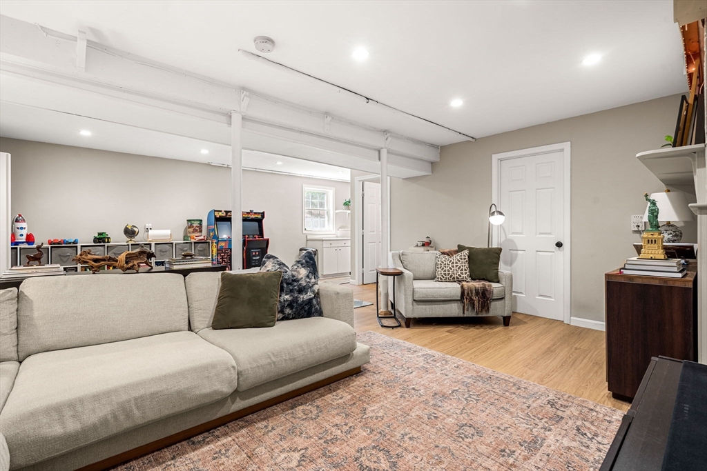 19 Powhatan Road Pepperell, MA 01463 - Photo 29 of 38 a living room with furniture and a couch