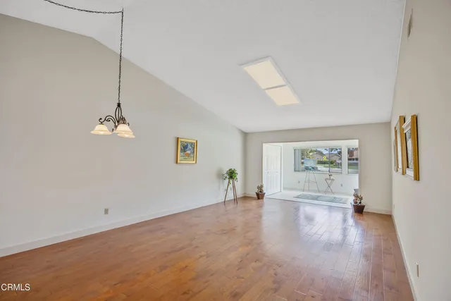 a view of livingroom with furniture wooden floor and window