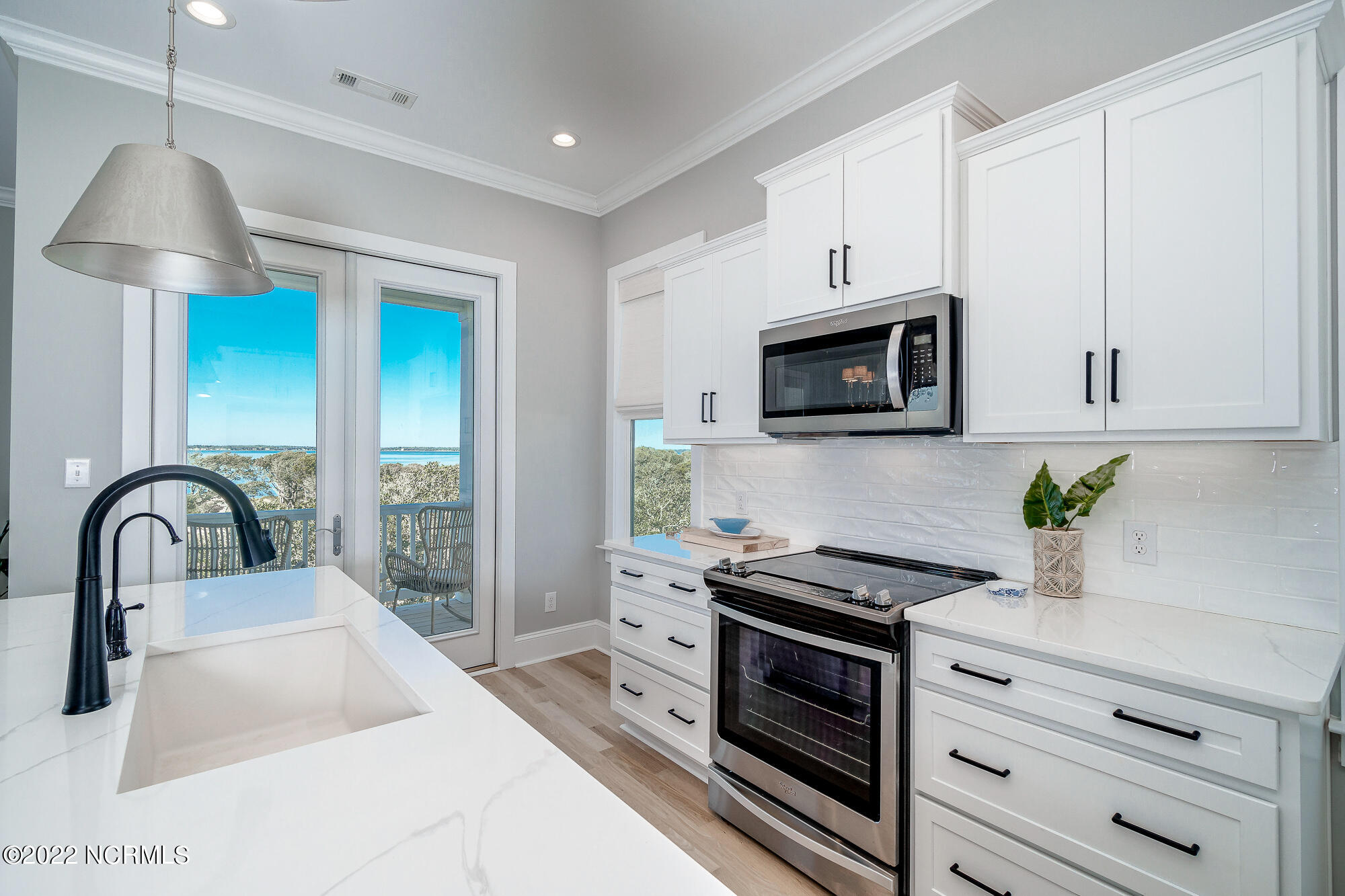 1804 Salter Path Road Indian Beach, NC 28512 - Photo 22 of 74 Light-filled kitchen w/ island seating
