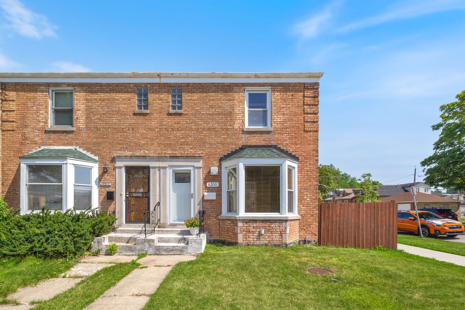5300 West Foster Avenue Chicago, IL 60630 - Photo 1 of 27 a front view of house with yard and outdoor seating