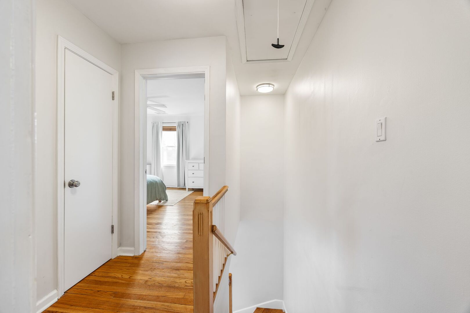 5300 West Foster Avenue Chicago, IL 60630 - Photo 12 of 27 a view of a hallway with wooden floor and entryway