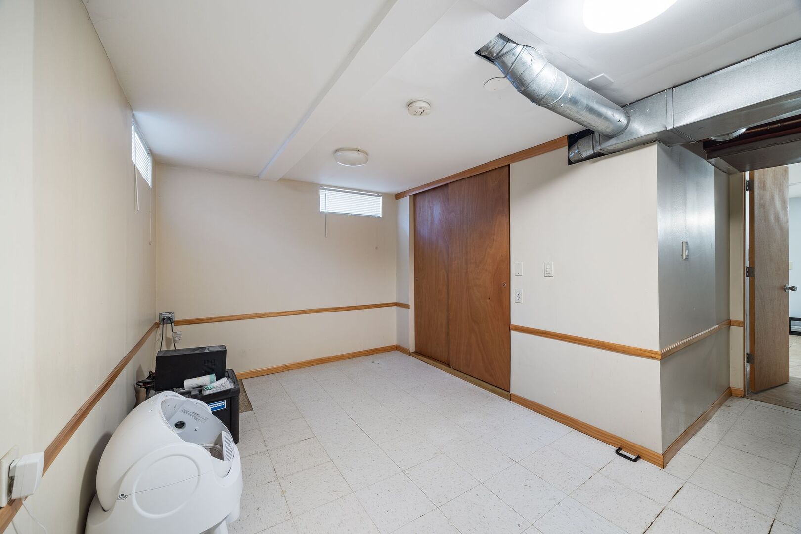5300 West Foster Avenue Chicago, IL 60630 - Photo 18 of 27 a view of storage and utility room with closet