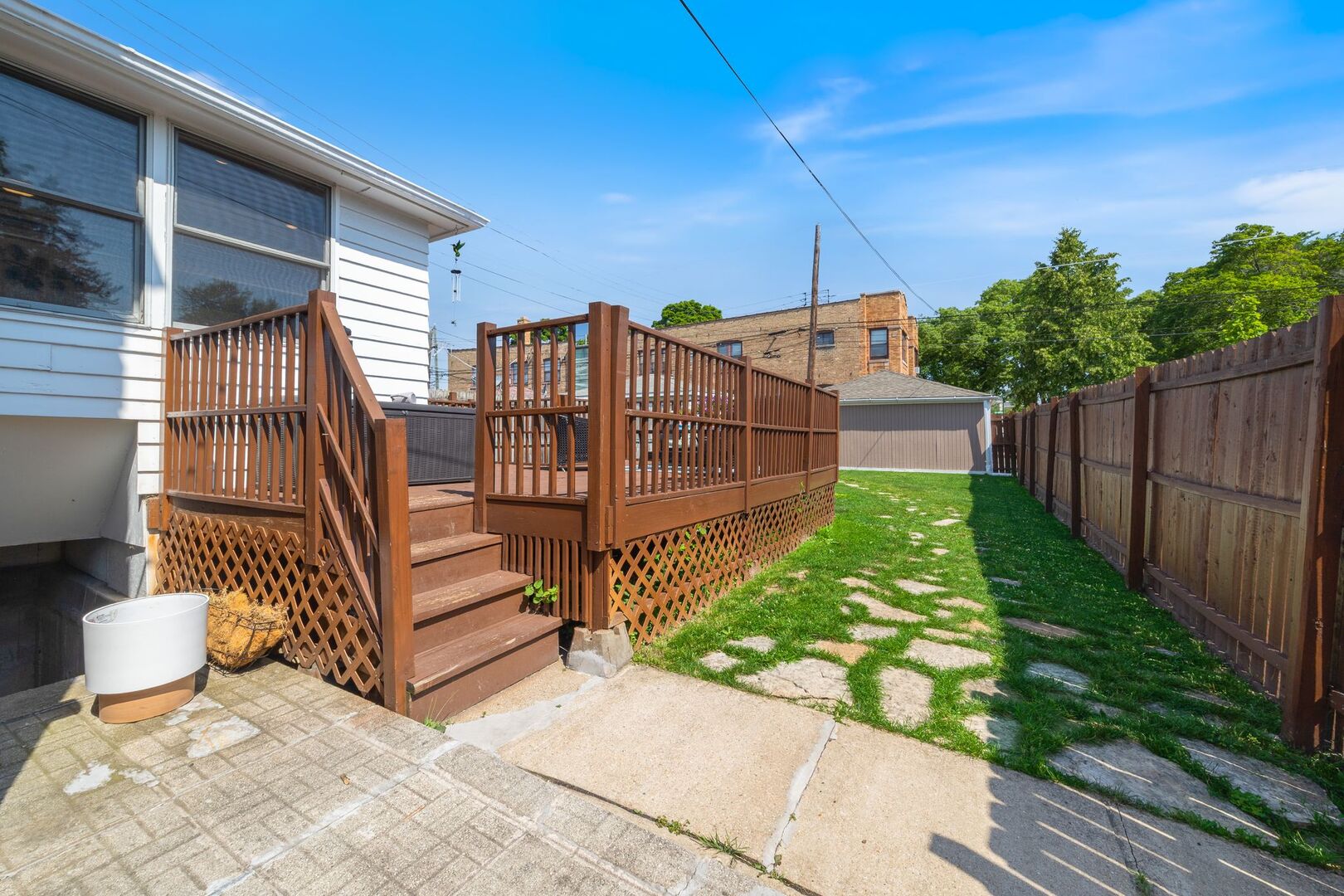 5300 West Foster Avenue Chicago, IL 60630 - Photo 23 of 27 a view of a porch with a yard