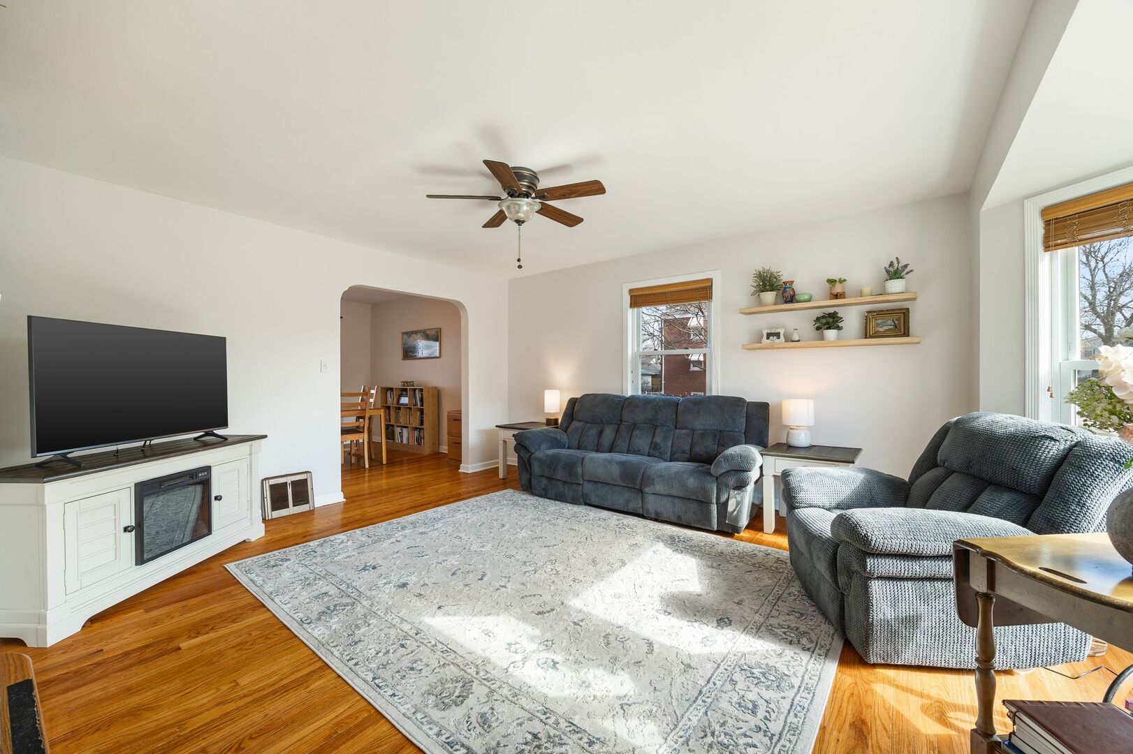 5300 West Foster Avenue Chicago, IL 60630 - Photo 4 of 27 a living room with furniture and a flat screen tv