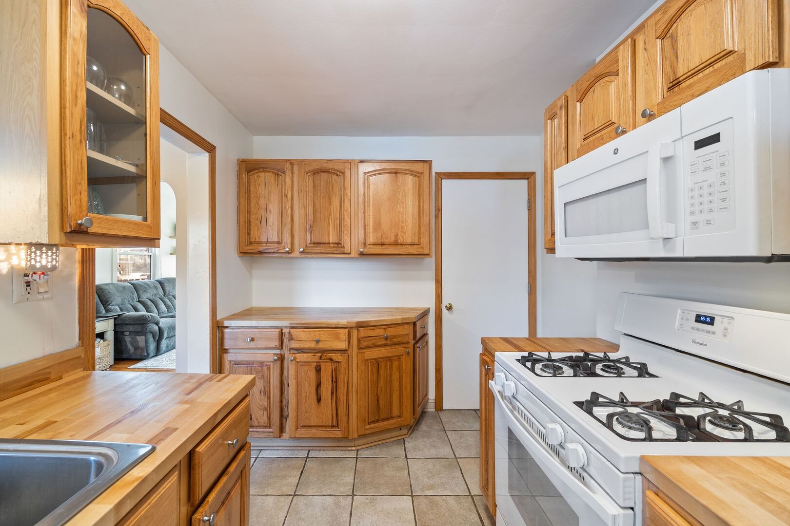 5300 West Foster Avenue Chicago, IL 60630 - Photo 8 of 27 a kitchen with a stove and a sink