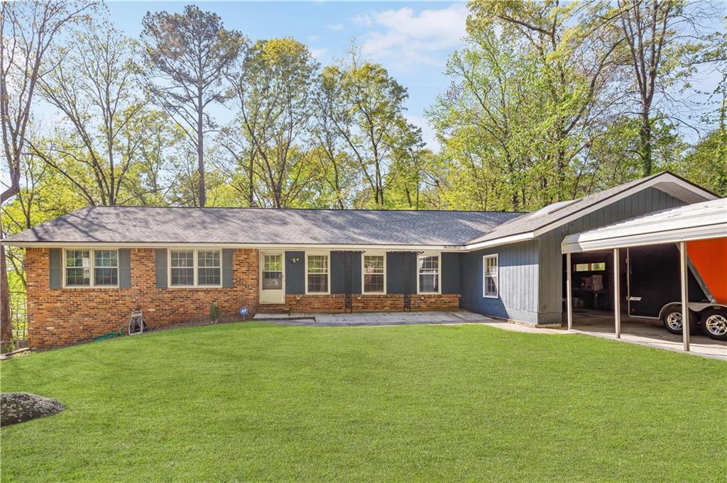 a house view with a garden space