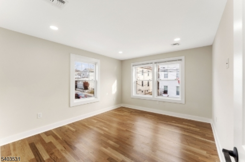 306 Carnegie Place Union, NJ 07088 - Photo 12 of 23 a view of an empty room with a window