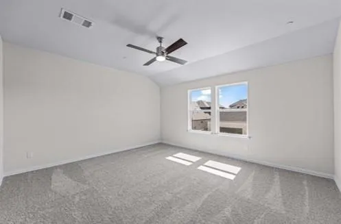 a view of empty room with windows