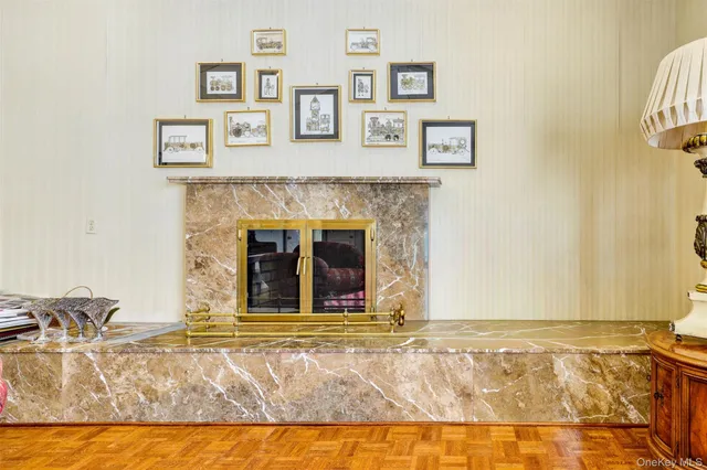 a large white kitchen with a sink and refrigerator