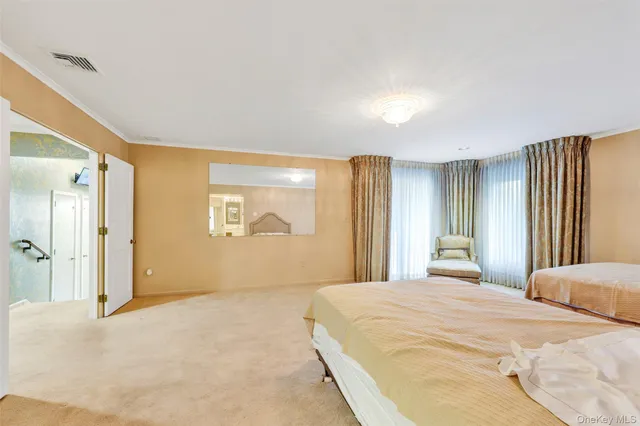 a bathroom with a shower sink and mirror