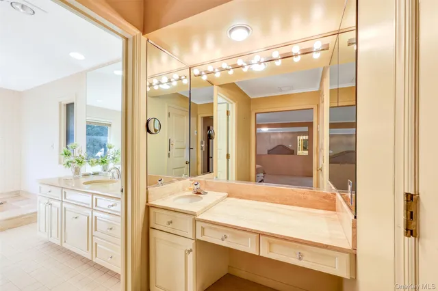 a bedroom with double bed and a window