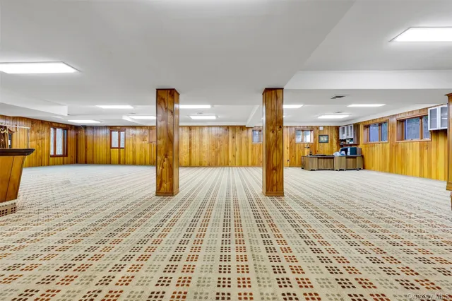 a view of kitchen with furniture and fireplace