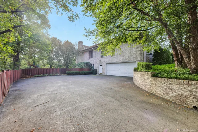 a garden view with a fountain