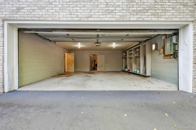 an aerial view of house with yard