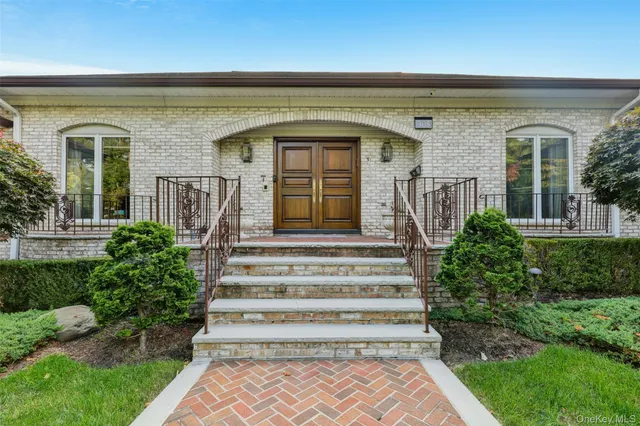 a front view of a house with a porch